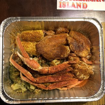 Fisherman's Island - a tray of crab legs and corn - Seafood Near Me - Lansing, Illinois Fisherman's Island - a tray of crab legs and corn - Seafood Near Me - Lansing, Illinois