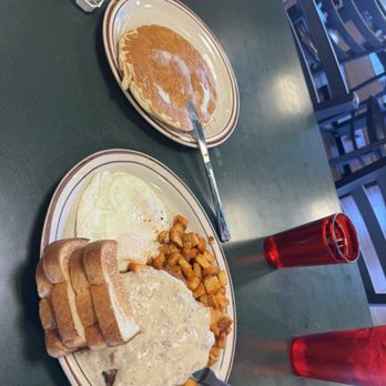 Egg & I - Chicken fried steak eggs over medium and potatoes. Then a side of pancakes. - Breakfast & Brunch Near Me - Las Vegas, Nevada Egg & I - Chicken fried steak eggs over medium and potatoes. Then a side of pancakes. - Breakfast & Brunch Near Me - Las Vegas, Nevada