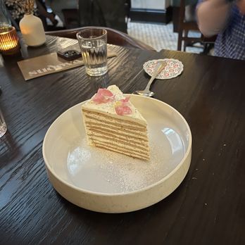 Sudova * Eastern European Kitchen - Medovik (honey lemon poppyseed cake) - Modern European Near Me - Cincinnati, Ohio Sudova * Eastern European Kitchen - Medovik (honey lemon poppyseed cake) - Modern European Near Me - Cincinnati, Ohio