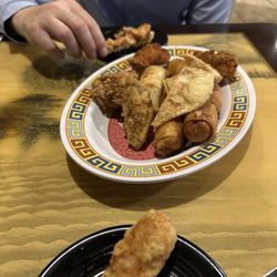 New Peking Chinese Restaurant - Gross poop platter full of fried food we didn't eat the thing was gross