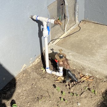 2 Brothers Landscaping - New valve with timer in garage - Landscaping Near Me 2 Brothers Landscaping - New valve with timer in garage - Landscaping Near Me