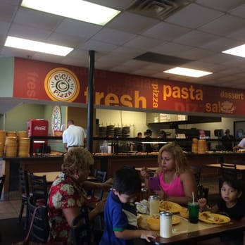 Cicis Pizza - a group of people eating in a restaurant - Pizza Near Me - Baton Rouge, Louisiana Cicis Pizza - a group of people eating in a restaurant - Pizza Near Me - Baton Rouge, Louisiana