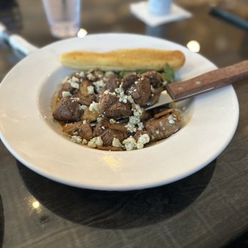 Johnny Blacks Public House - Steak tips appetizer with caramelized onions, blue cheese, mushrooms and rocket leaves.  Delicious! - Seafood Near Me - Shelby Township, Michigan