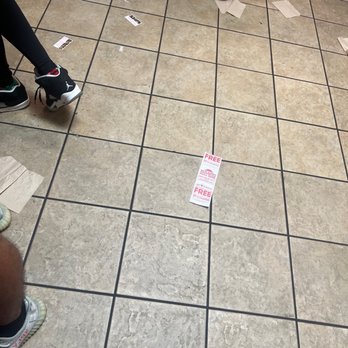 Pizza Hut - a group of people standing on a tiled floor - Pizza Near Me - Temple Hills, Maryland