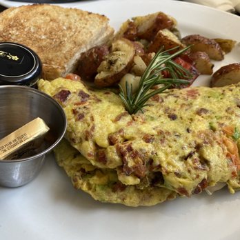 Twohey’s Restaurant - Omelette with some tasty potatoes - New American Near Me - South Pasadena, California Twohey’s Restaurant - Omelette with some tasty potatoes - New American Near Me - South Pasadena, California