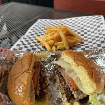 Auggie's Draft Room - Huge burger and fries- plenty big to share! - Sports Bars Near Me - Saint Augustine, Florida