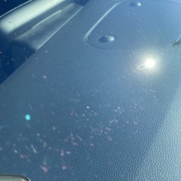 Red fabric left on my window from the towels that were used to dry off. Red fabric left on my window from the towels that were used to dry off.