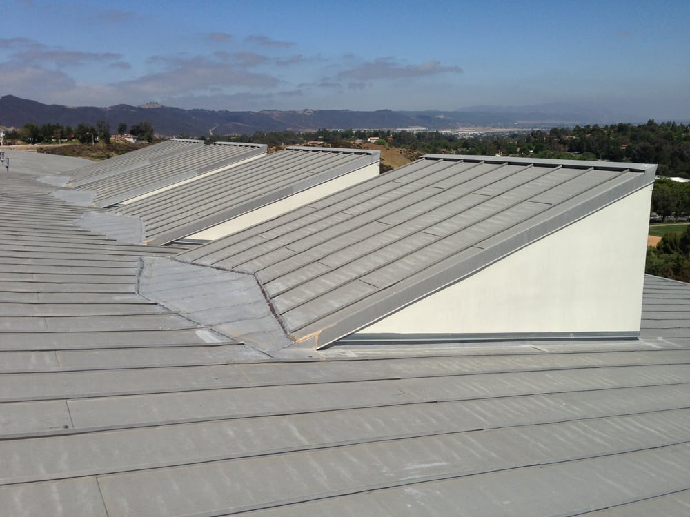 Slide of TWM Roofing