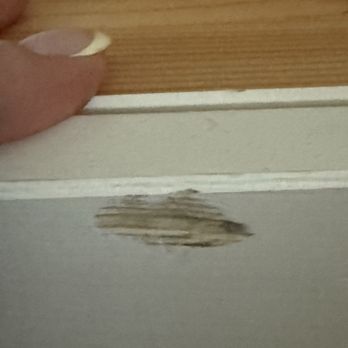 Hernia Movers - Chipped wooden bookcase - Movers Near Me - Milwaukee, Wisconsin