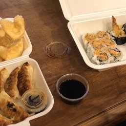 Gyoza, Crab Rangoon, Spicy Salmon Roll, and Shrimp Tempura Roll Gyoza, Crab Rangoon, Spicy Salmon Roll, and Shrimp Tempura Roll