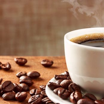 Simply Brewed Coffee - a cup of coffee and coffee beans - Coffee & Tea Near Me - Clinton, North Carolina Simply Brewed Coffee - a cup of coffee and coffee beans - Coffee & Tea Near Me - Clinton, North Carolina