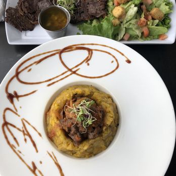 Ocean Boulevard - From 2 for $25 menu  Top: Churrasco al Grill ($16.95 a la carte) Bottom:Mofongo Relleno de Churrasco ($16.95 a la carte) as of Aug 2020. - Caribbean Near Me - Aguada, Puerto Rico
