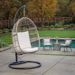 Sheridan's Home & Patio - Elegant egg chairs for your backyard oasis.