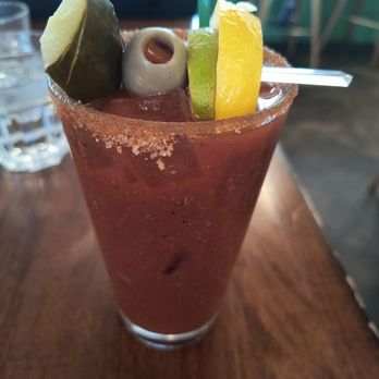 Four Friends Kitchen - Spicy bloody Mary. I loved it except I was expecting a dill pickle instead of a bread and butter. - Southern Near Me - Denver, Colorado