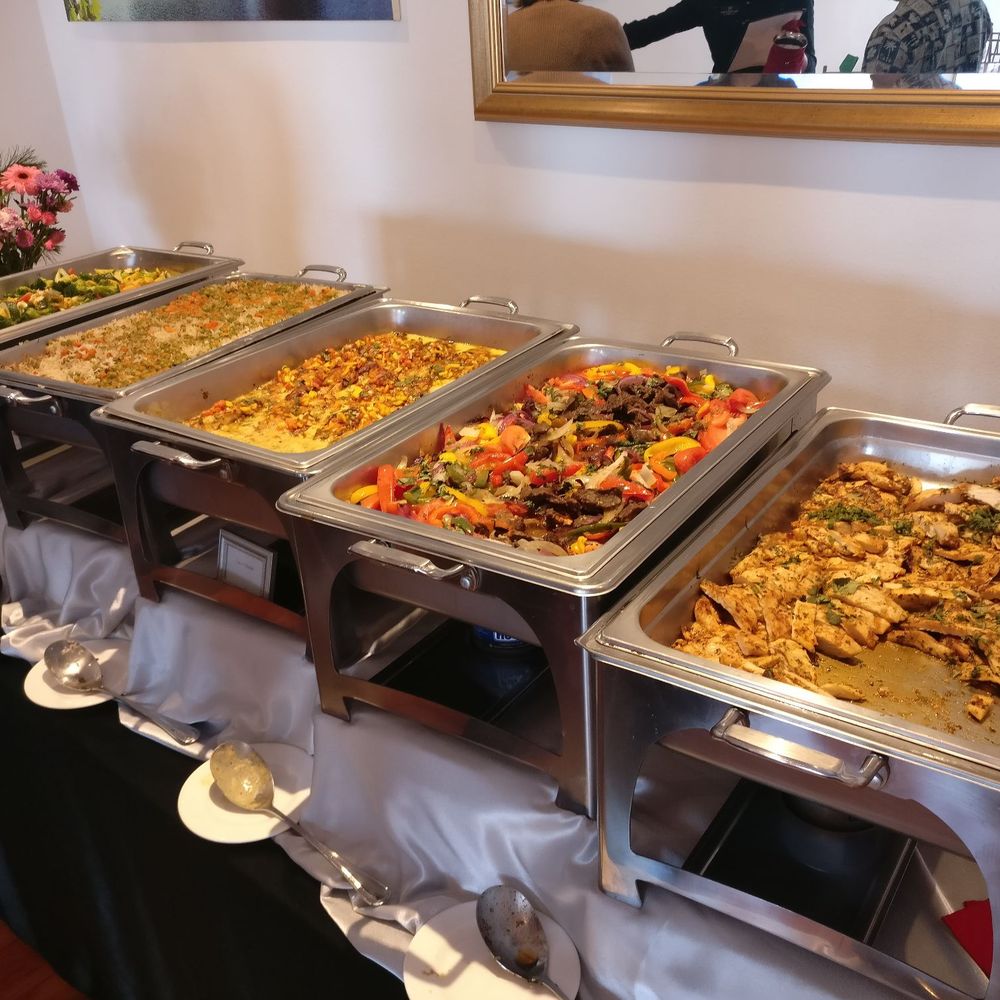 Chef's Catering - Lunch spread for their Latin menu - Caterers Near Me