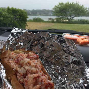 The Net Result - Tasty Buttered lobster roll with a side of cocktail shrimp! Lovely view from the parking lot too! - Seafood Near Me - Vineyard Haven, Massachusetts The Net Result - Tasty Buttered lobster roll with a side of cocktail shrimp! Lovely view from the parking lot too! - Seafood Near Me - Vineyard Haven, Massachusetts