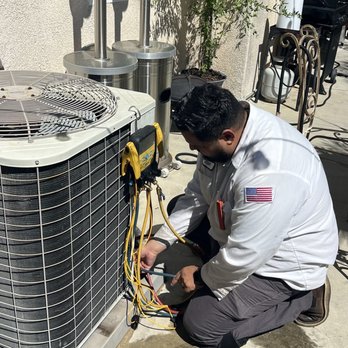 Specialize Home Service - Josh diagnosing the AC. - Heating & Air Conditioning/HVAC Near Me - Fontana, California Specialize Home Service - Josh diagnosing the AC. - Heating & Air Conditioning/HVAC Near Me - Fontana, California