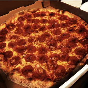 Home Slice Pizza - Pepperoni pizza. Half with garlic sauce. - Pizza Near Me - Austin, Texas Home Slice Pizza - Pepperoni pizza. Half with garlic sauce. - Pizza Near Me - Austin, Texas