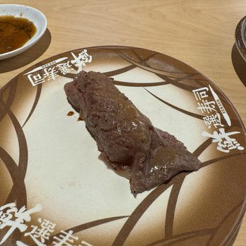 Waka Sakura - Wagyu beef with salt seasoning. Major yum. $5.49 for one piece so better to order the 3 piece variety for $11.99 as of May 2024 - Conveyor Belt Sushi Near Me - Gardena, California