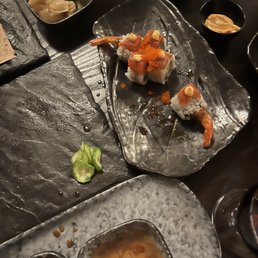 a variety of sushi dishes a variety of sushi dishes