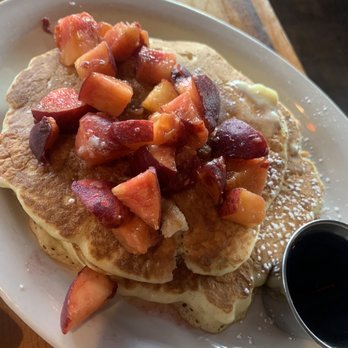 Ria's Bluebird - Peach topped pancakes without whipped cream - Southern Near Me - Atlanta, Georgia Ria's Bluebird - Peach topped pancakes without whipped cream - Southern Near Me - Atlanta, Georgia