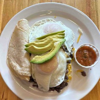 Nye Beach Cafe - Huevos rancheros on cheesy polenta. - Cafes Near Me - Newport, Oregon Nye Beach Cafe - Huevos rancheros on cheesy polenta. - Cafes Near Me - Newport, Oregon