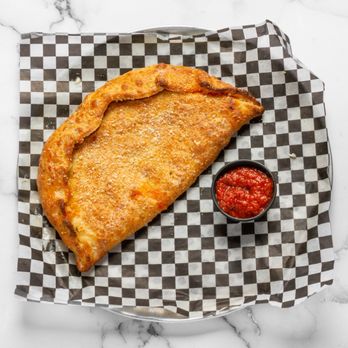 UFO Pizza - Calzone - Pizza Near Me - Edmonton, Alberta UFO Pizza - Calzone - Pizza Near Me - Edmonton, Alberta