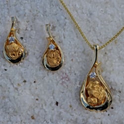 Gold Rush Fine Jewelry - 14Kt yellow gold matching earrings and pendant with natural Alaskan gold nuggets and diamonds. Hand made in our shop.  GRE121D & GRP317D