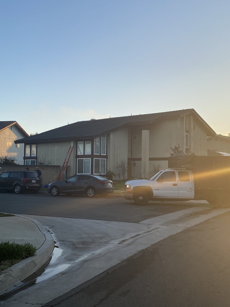 Slide of Yoshida Roofing Company