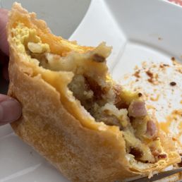 Look closely at the middle of the burrito. There was a hair inside my burrito. Know it wasn't mine because it was wavy & short.
