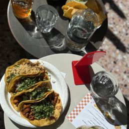 Chips and guac , chicken taco, brisket taco Chips and guac , chicken taco, brisket taco