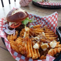 Riley's Pub - Pulled pork burger..with waffle fry poutine!! Mmmmm