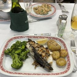 A Carvoaria - Grilled swordfish in front, rear has the shrimp dejonghe type dish
