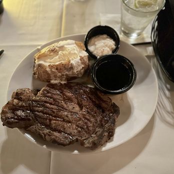 The Bull Pen - rib eye steak; baked potato; horse radish; au jus - Steakhouses Near Me - Redondo Beach, California The Bull Pen - rib eye steak; baked potato; horse radish; au jus - Steakhouses Near Me - Redondo Beach, California