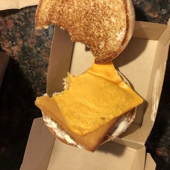 McDonald's - a half eaten sandwich with cheese on it - Fast Food Near Me - Englewood, Colorado McDonald's - a half eaten sandwich with cheese on it - Fast Food Near Me - Englewood, Colorado