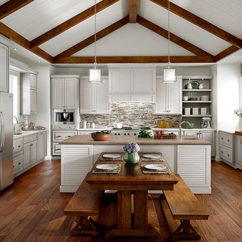 Swartz Kitchens & Baths - a kitchen with white cabinets and wood floors - Kitchen & Bath Near Me - Harrisburg, Pennsylvania Swartz Kitchens & Baths - a kitchen with white cabinets and wood floors - Kitchen & Bath Near Me - Harrisburg, Pennsylvania