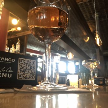 Artango Bar & Steakhouse - Rosé at the bar - Argentine Near Me - Chicago, Illinois Artango Bar & Steakhouse - Rosé at the bar - Argentine Near Me - Chicago, Illinois