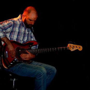 Steamworks Creative - a man playing a bass guitar - Music Venues Near Me - Gibsonia, Pennsylvania Steamworks Creative - a man playing a bass guitar - Music Venues Near Me - Gibsonia, Pennsylvania