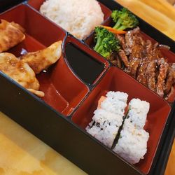 Kumo Japanese Restaurant - Bento Box: Teriyaki Beef with Veggies, Rice, 4 Piece California Roll, 3 Piece Gyoza