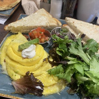 First Watch - Bacado Omelet with sourdough toast and greens - Breakfast & Brunch Near Me - Layton, Utah