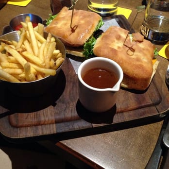 Earls Kitchen + Bar - Cajun Chicken Sandwich with fries and gravy. - Canadian (New) Near Me - Calgary, Alberta Earls Kitchen + Bar - Cajun Chicken Sandwich with fries and gravy. - Canadian (New) Near Me - Calgary, Alberta