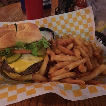 Village Hide-A-Way - 1/2 pound cheeseburger deluxe(lettuce, tomato and mayo) with everything(ketchup, mustard, onion, pickles) and a side of fries. - Sports Bars Near Me - Vicksburg, Michigan Village Hide-A-Way - 1/2 pound cheeseburger deluxe(lettuce, tomato and mayo) with everything(ketchup, mustard, onion, pickles) and a side of fries. - Sports Bars Near Me - Vicksburg, Michigan