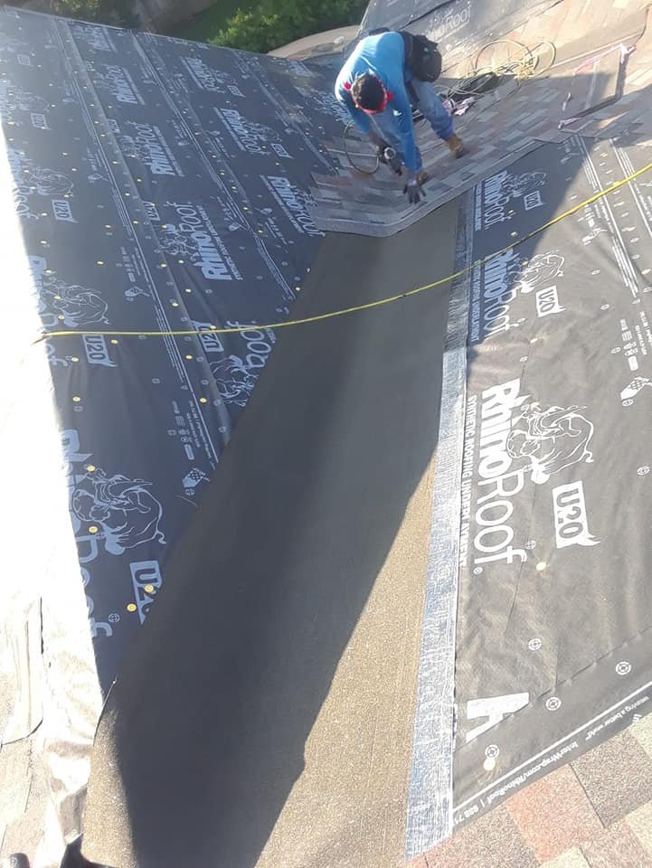 Slide of Junior Roofing & Repair