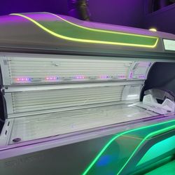Revive Wellness, Tanning and Cryo+ Lounge - Vitality Total Light Therapy bed offering Red and Blue light therapies and can be used with or without tanning!