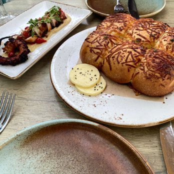 Driftwood Kitchen - Grilled Spanish Octopus  Parker House Roll - Seafood Near Me - Laguna Beach, California