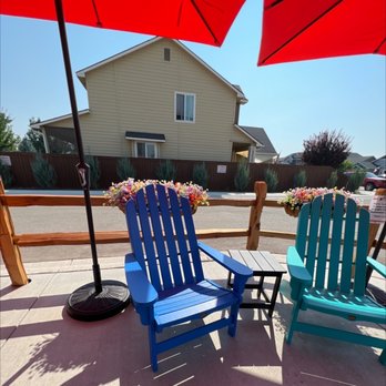 Biggby Coffee - two chairs and an umbrella - Coffee & Tea Near Me - Meridian, Idaho