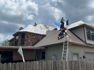 Slide of Arnold's Roofing