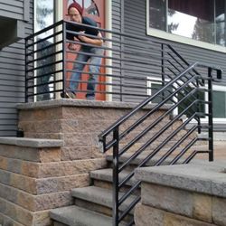 Ace Iron Works - Dave touching up the New RRailings Bellevue