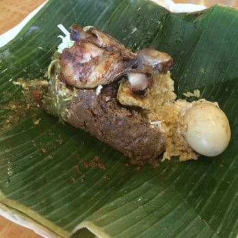 Java Spice - Nasi Bungkus! - It's rice wrapped in banana leaf, with egg, beef, chicken, tofu, and addictive spicy green chili. - Indonesian Near Me - Rowland Heights, California