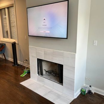 Renovate Me - a flat screen tv above a fireplace - General Contractors Near Me Renovate Me - a flat screen tv above a fireplace - General Contractors Near Me